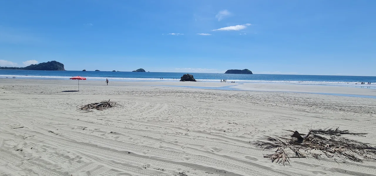 Sunny beach and blue ocean in Costa Rica