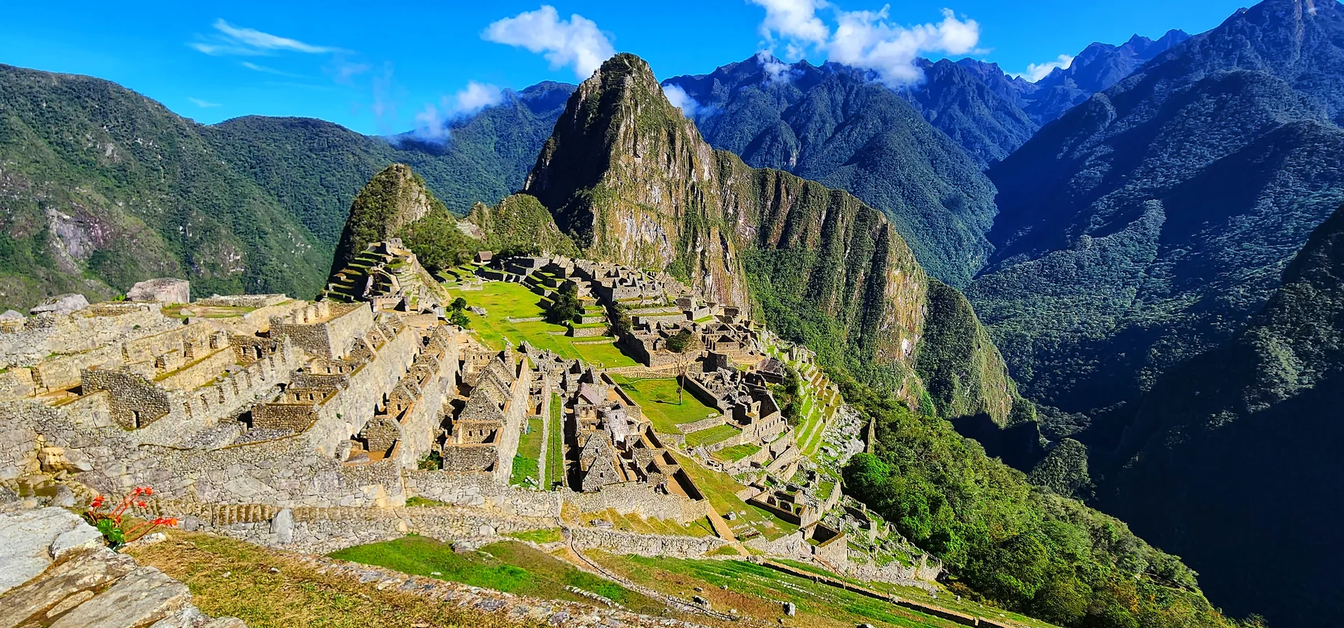 A panoramic view of Machu Picchu and the surrounding mountains